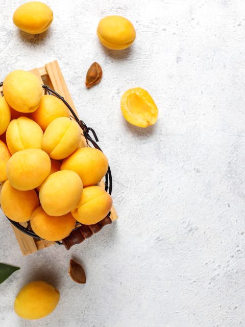 Fresh organic apricots,summer fruit,top view Fresh organic apricots,summer fruit,top view